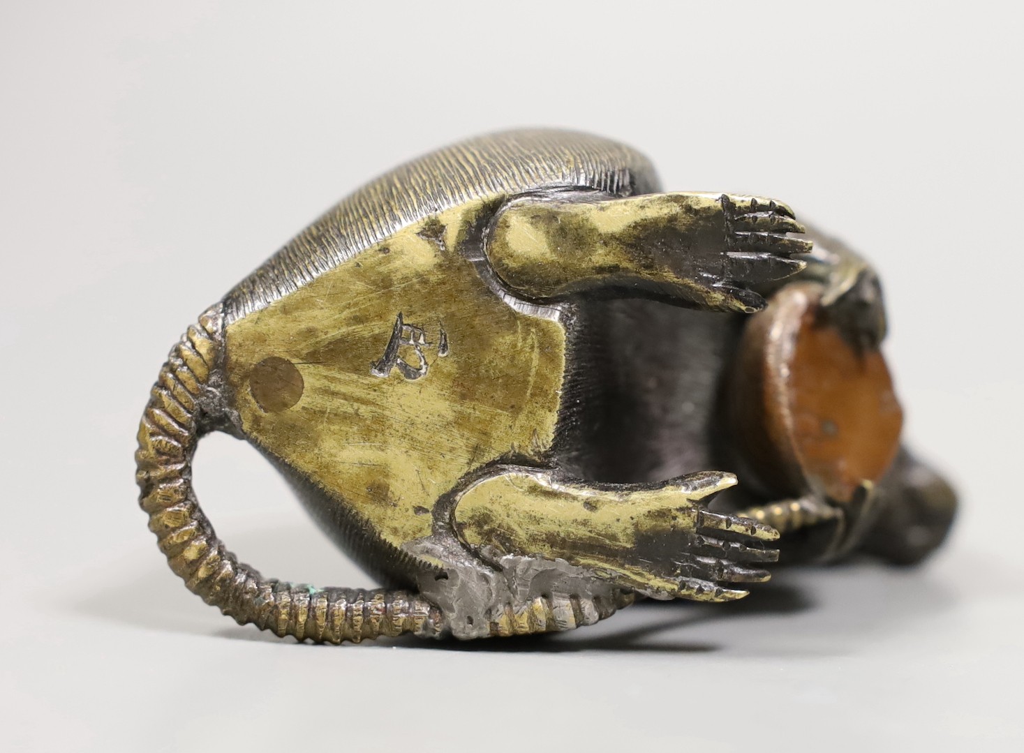 A small Meiji Japanese bonze seated rat with nut, kakihan mark, 7cm tall